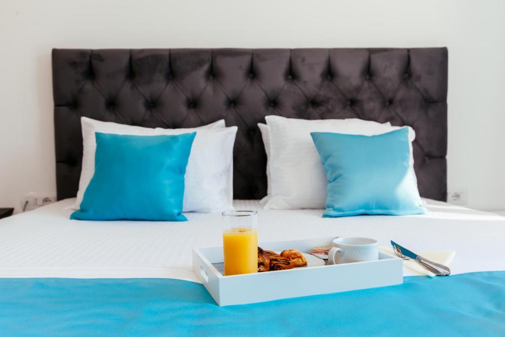 Postel nebo postele na pokoji v ubytování Hotel Ambiente Ulcinj