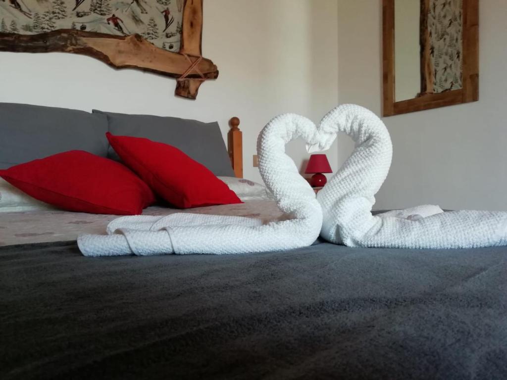 Posteľ alebo postele v izbe v ubytovaní Fleurs De Neige