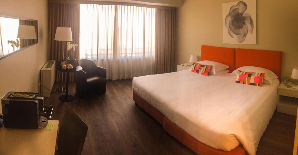 Posteľ alebo postele v izbe v ubytovaní Hotel Blaise & Francis