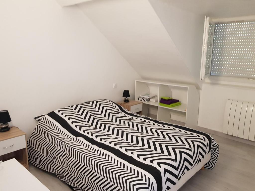 Postel nebo postele na pokoji v ubytování Lourdes Guest House