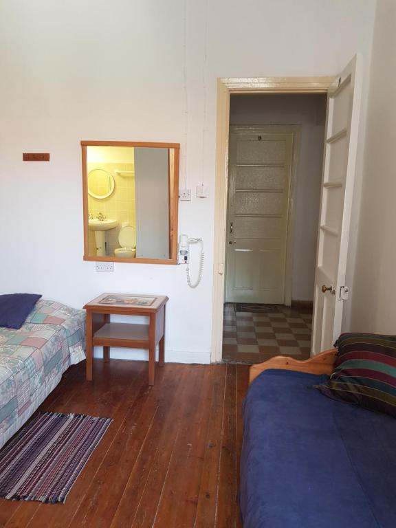 Postel nebo postele na pokoji v ubytování Trianon