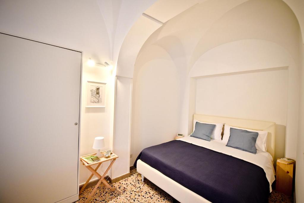 Posteľ alebo postele v izbe v ubytovaní Casa Giulia Holiday House