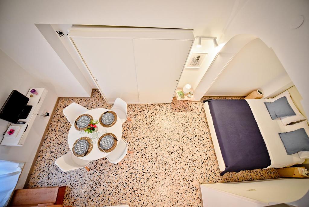 Televízia a/alebo spoločenská miestnosť v ubytovaní Casa Giulia Holiday House