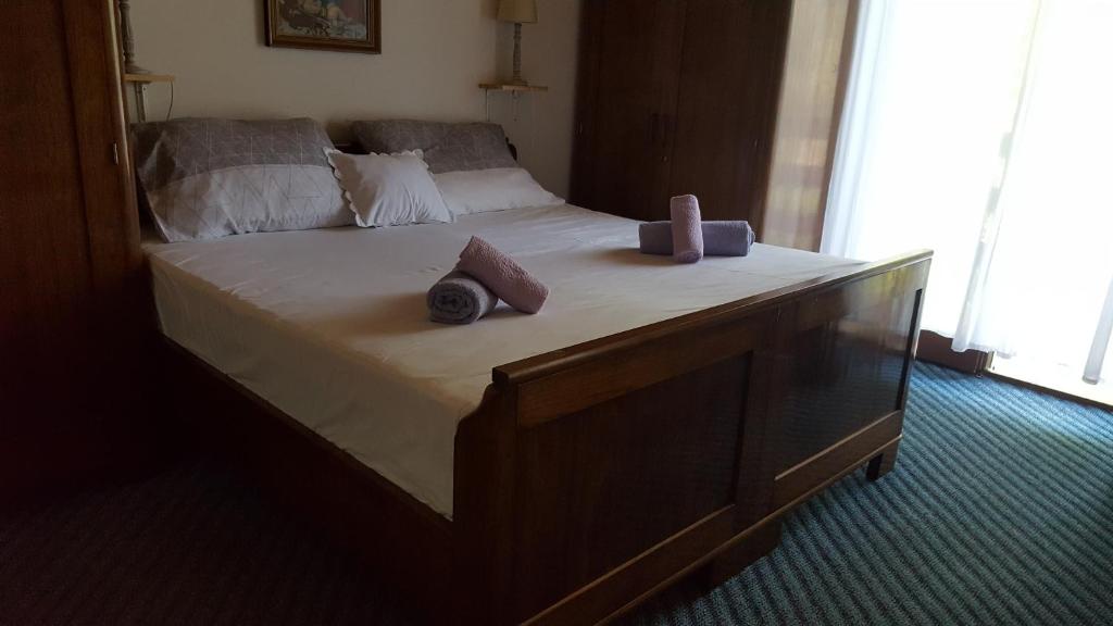 Postel nebo postele na pokoji v ubytování Kod Basaričeka