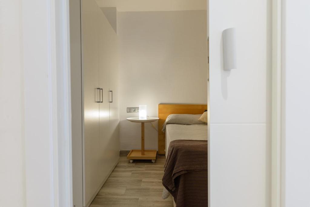 Posteľ alebo postele v izbe v ubytovaní Apartamento en la Playa de la Fosca