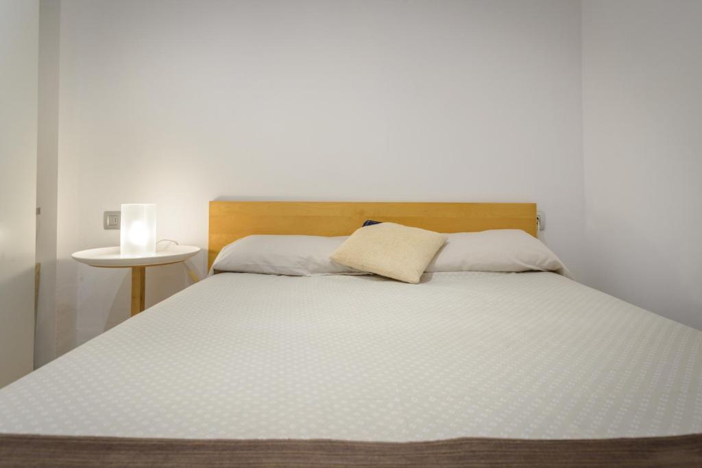 Posteľ alebo postele v izbe v ubytovaní Apartamento en la Playa de la Fosca