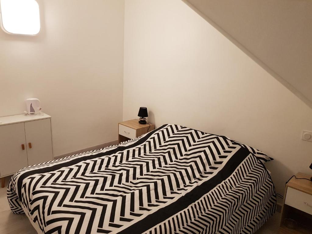Postel nebo postele na pokoji v ubytování Lourdes Guest House