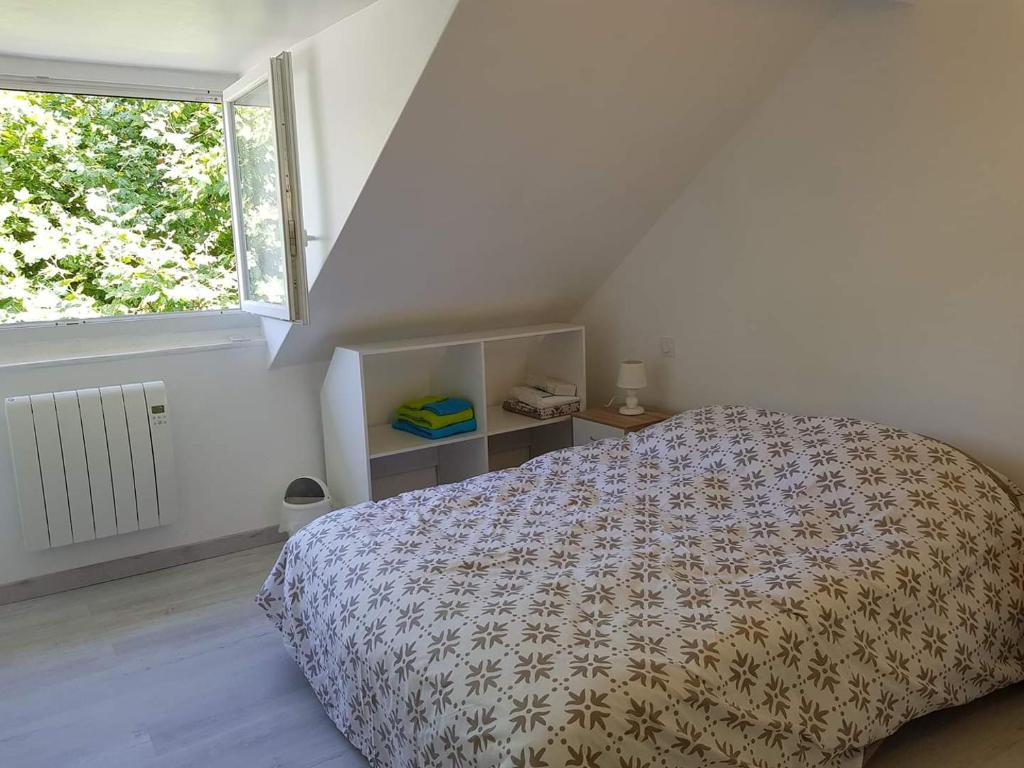 Postel nebo postele na pokoji v ubytování Lourdes Guest House