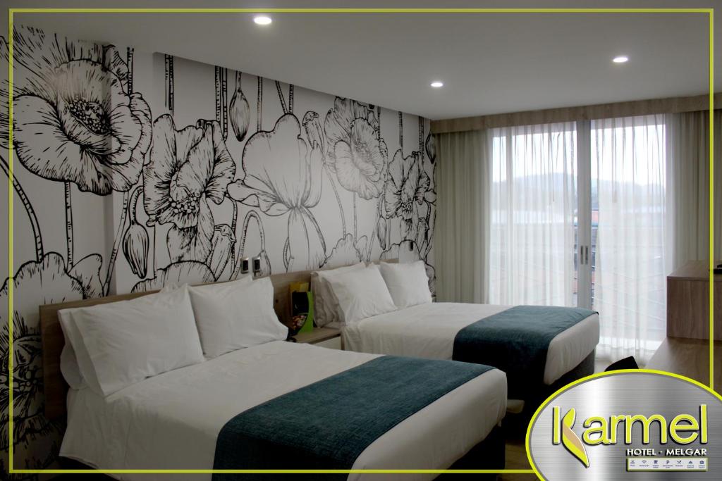 Una cama o camas en una habitación de Hotel Karmel