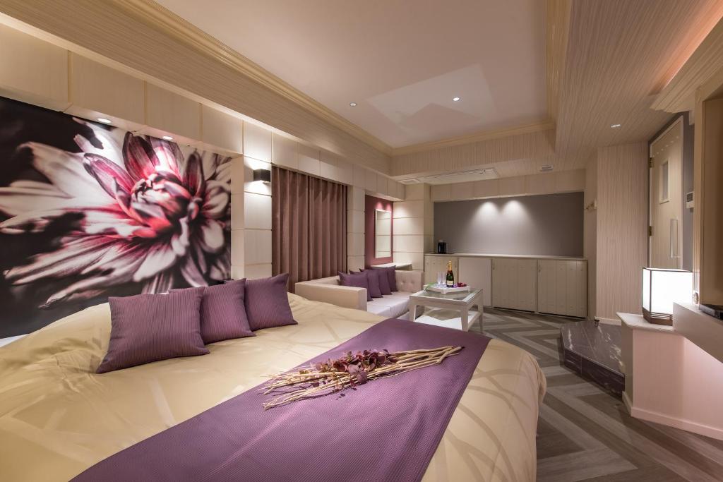 Postel nebo postele na pokoji v ubytování Hotel Zen Ichinomiya (Adult Only)