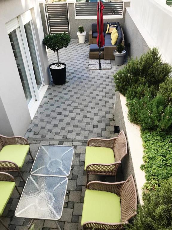 Posedenie v ubytovaní Holiday Home Aspalathos - with free parking, near the beach, a few minutes' walking distance to the UNESCO Palace