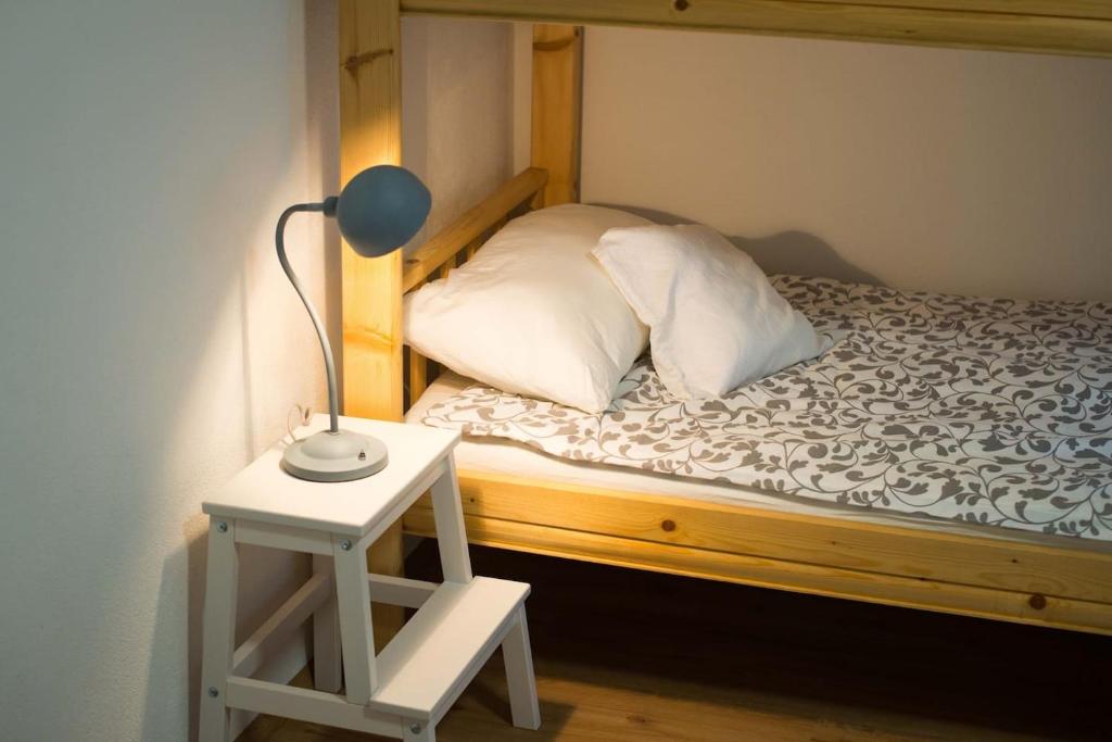 Postel nebo postele na pokoji v ubytování Apartma Liza