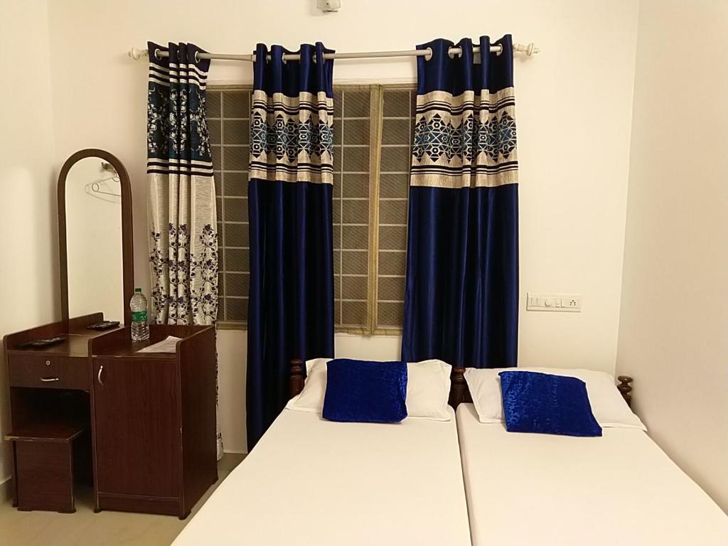 Postel nebo postele na pokoji v ubytování ChristVille