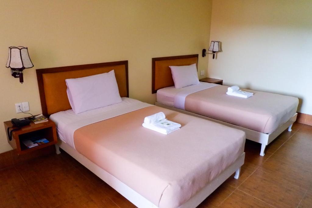 Postel nebo postele na pokoji v ubytování Albergo Hotel