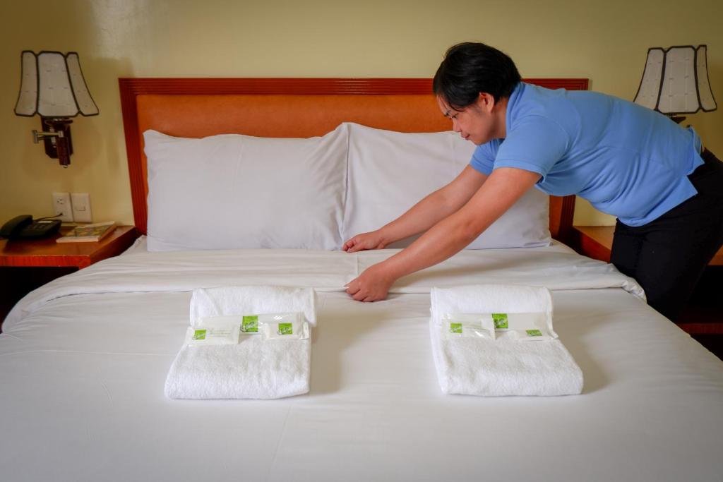 Postel nebo postele na pokoji v ubytování Albergo Hotel