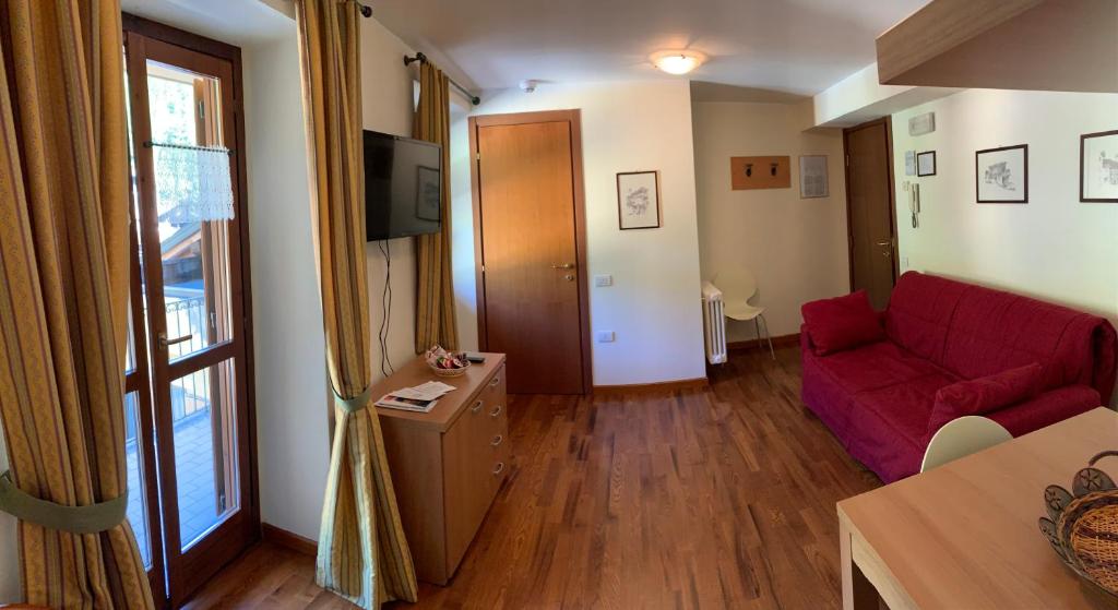 A television and/or entertainment centre at R.T.A. Hotel Monte Rosa