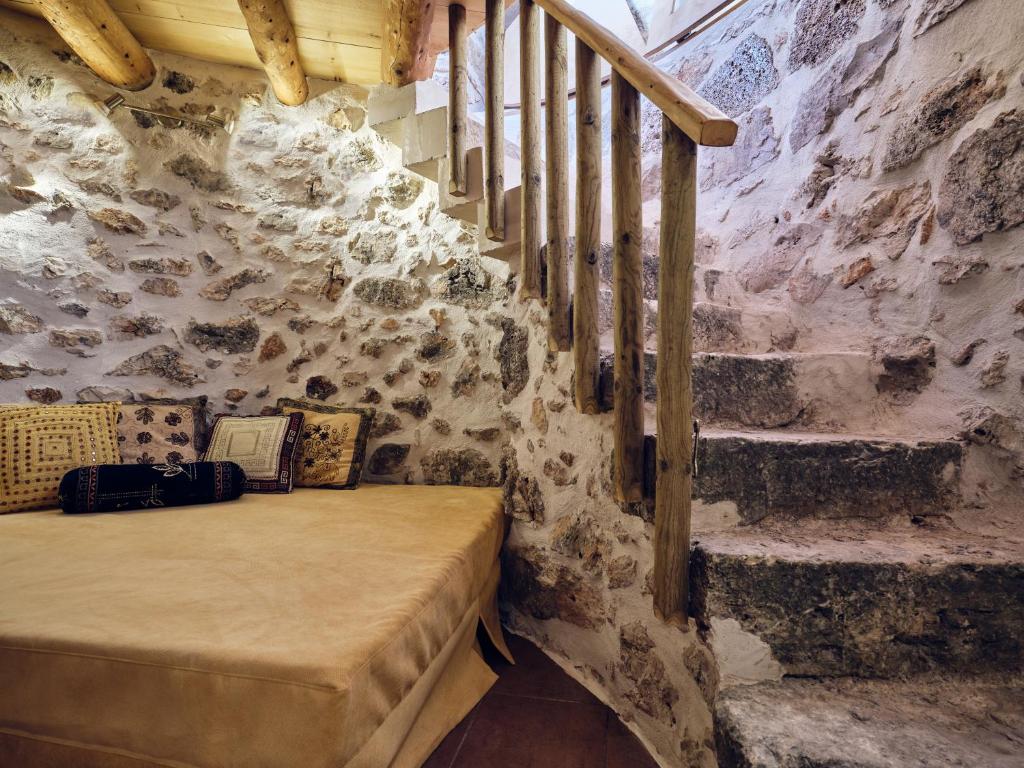Postel nebo postele na pokoji v ubytování Anemomilos