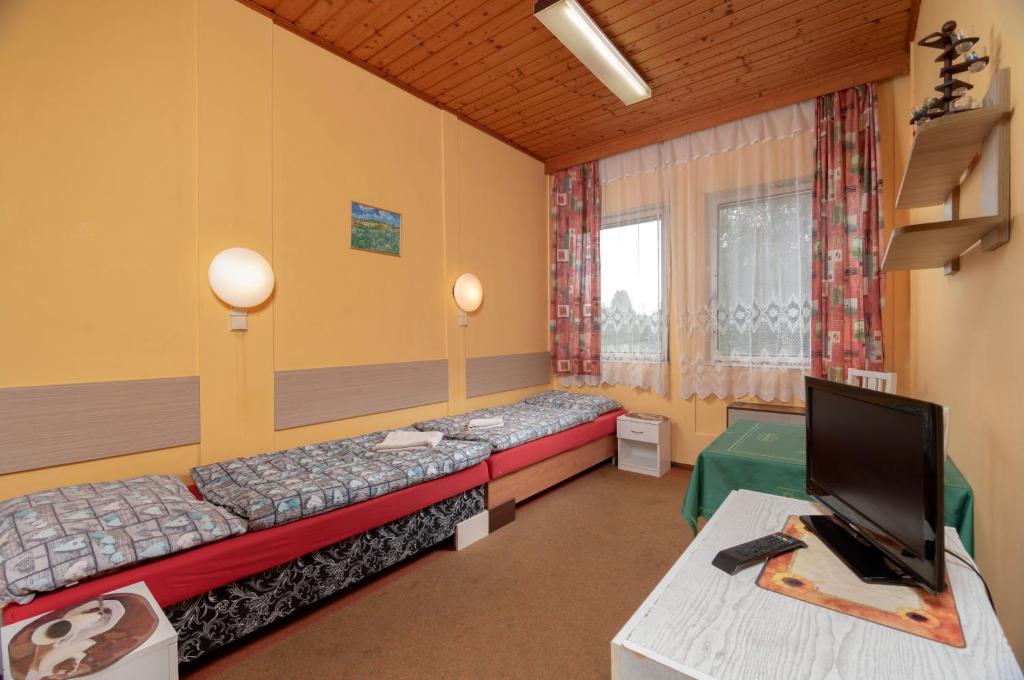 Postel nebo postele na pokoji v ubytování Ubytovna Z-SPORT