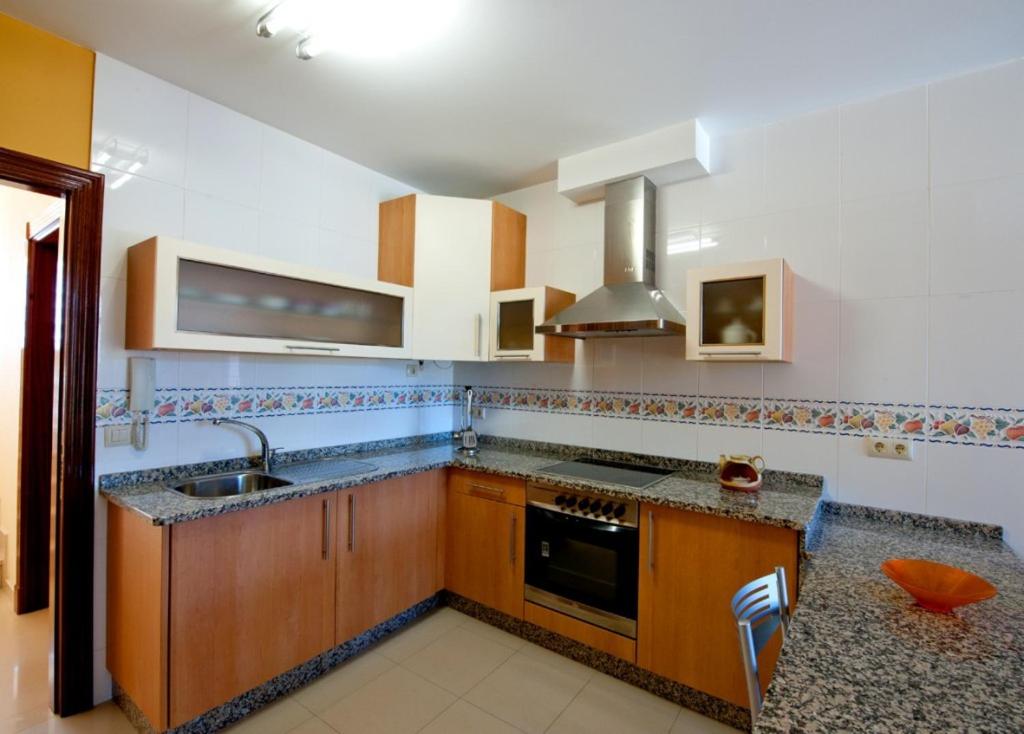 Kuchyňa alebo kuchynka v ubytovaní Apartamentos Rurales de Abelleira