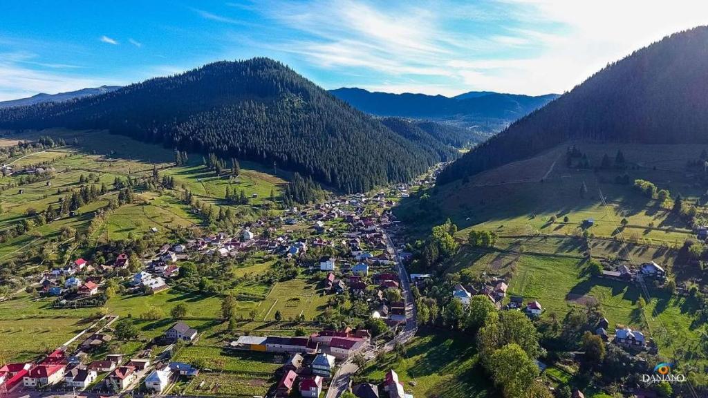 an aerial view of a village in a mountain at Casa Burduhos in Câmpulung Moldovenesc