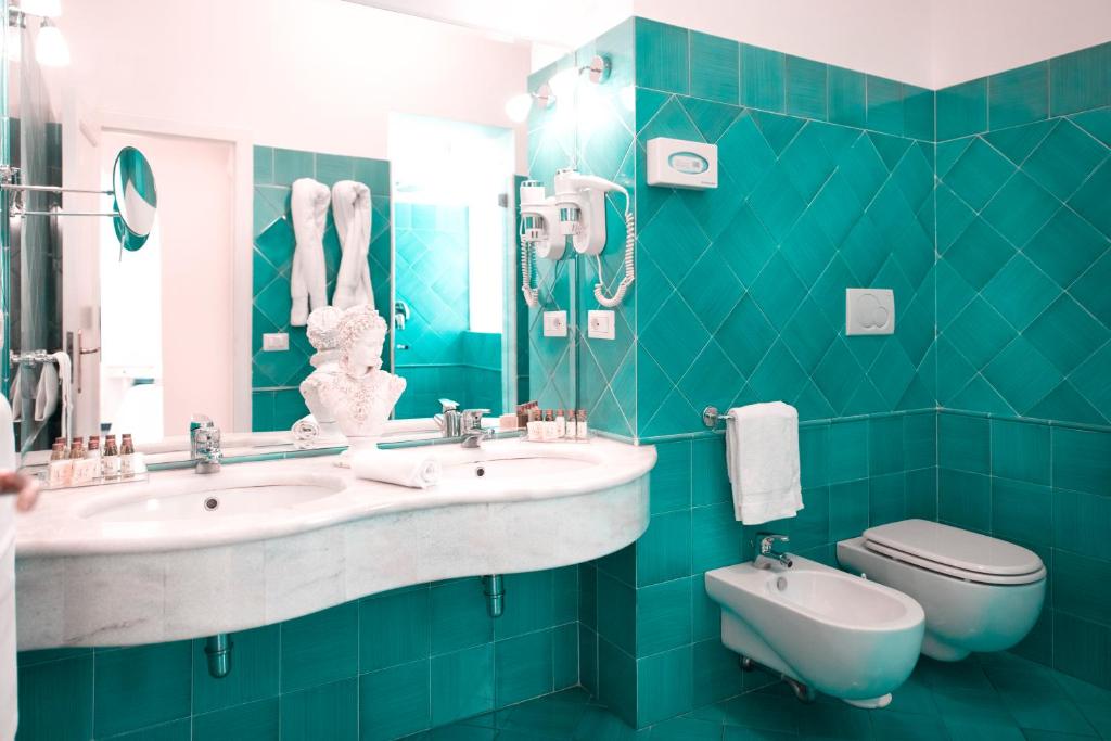 Koupelna v ubytování Hotel Savoia