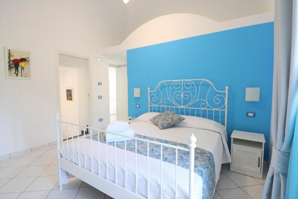 Postel nebo postele na pokoji v ubytování Villa Vittoria