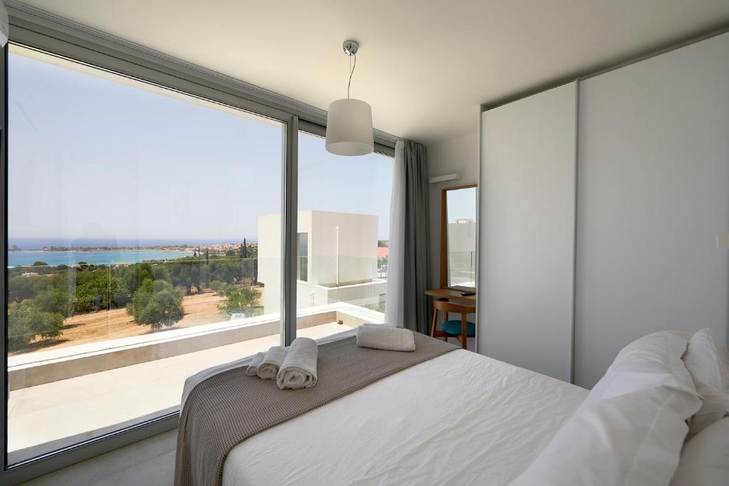 Voodi või voodid majutusasutuse Kalypso Residence toas