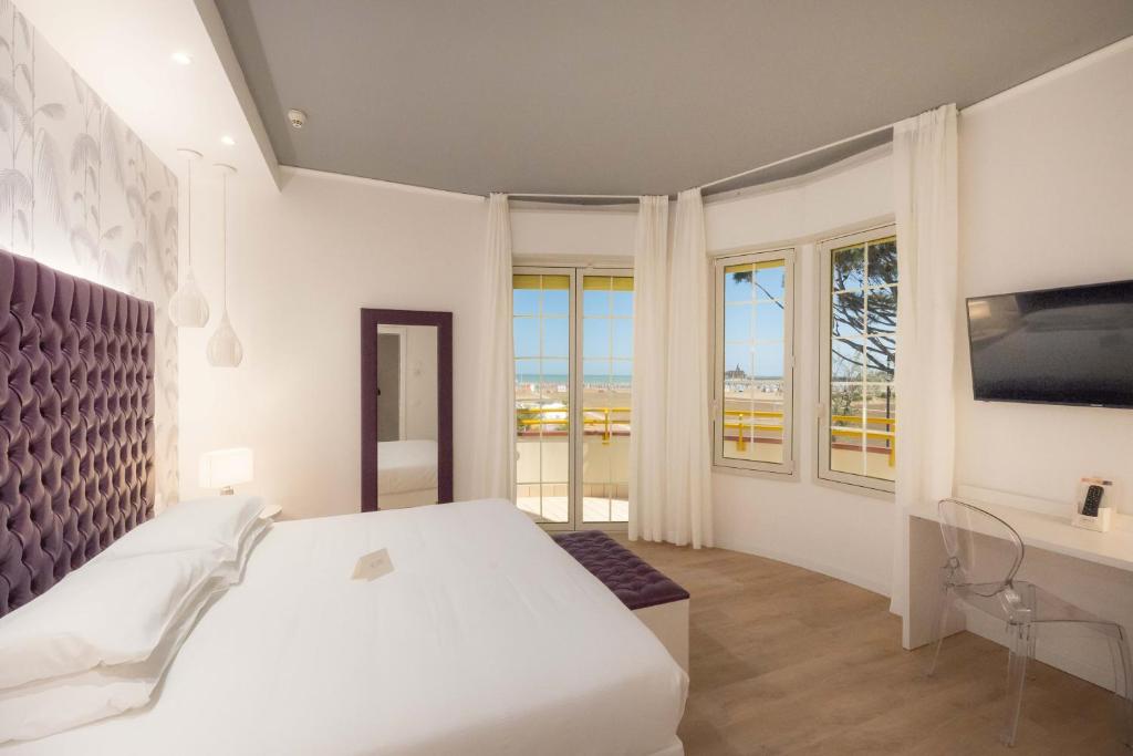 Postel nebo postele na pokoji v ubytování Park Hotel Pineta