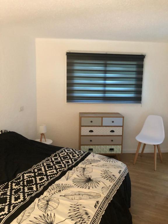 Postel nebo postele na pokoji v ubytování duplex vue mer exceptionnelle