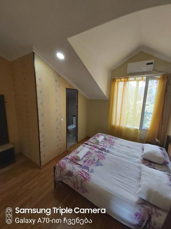 Postel nebo postele na pokoji v ubytování Martvili Newhotel
