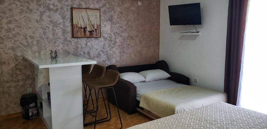 Postel nebo postele na pokoji v ubytování Oassis