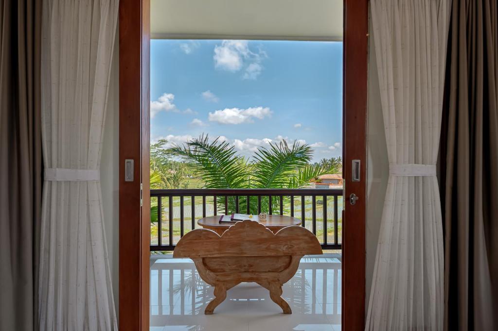 Balkón nebo terasa v ubytování Cenik Villa Ubud