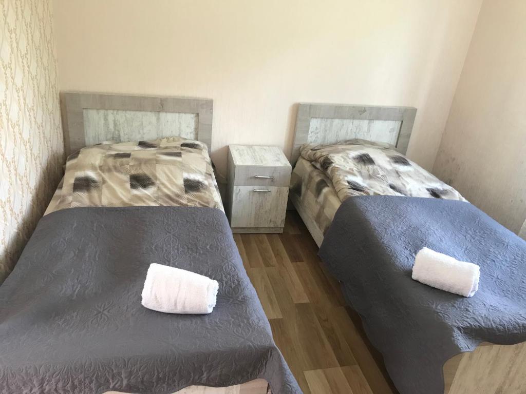 Postel nebo postele na pokoji v ubytování Maxvshi