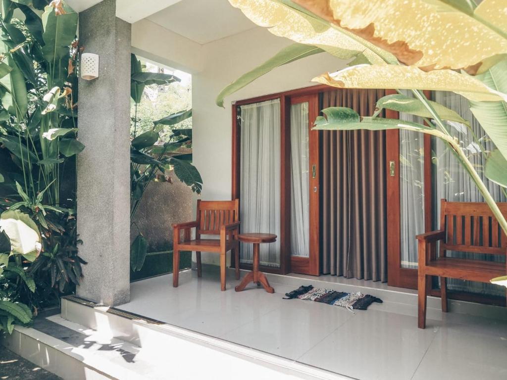 Balkón nebo terasa v ubytování UmahOde Bali