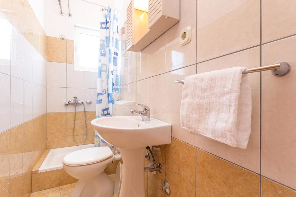 Koupelna v ubytování Apartments Sanja