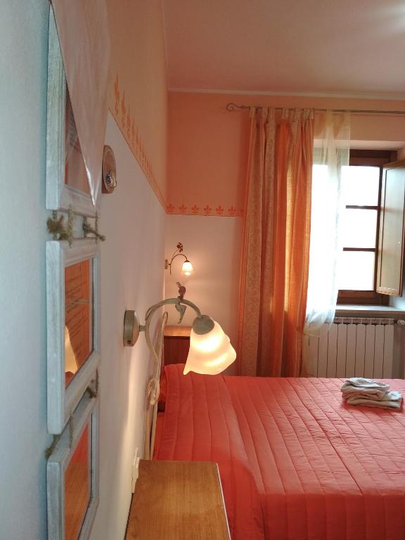 Postel nebo postele na pokoji v ubytování B&B Monticelli