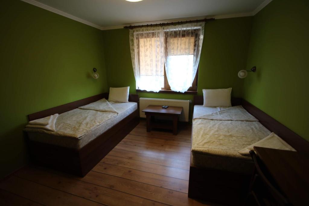 Postel nebo postele na pokoji v ubytování Къща за гости Джая
