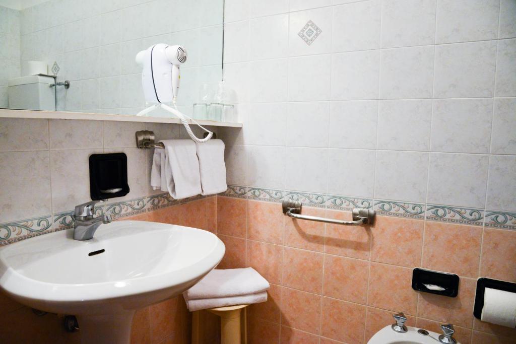 Koupelna v ubytování Hotel Domingo