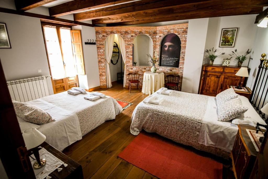 Postel nebo postele na pokoji v ubytování La Mora Cantana