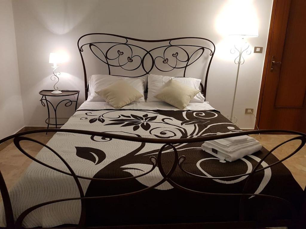 Posteľ alebo postele v izbe v ubytovaní Bed & Breakfast La Tana dei Sognatori
