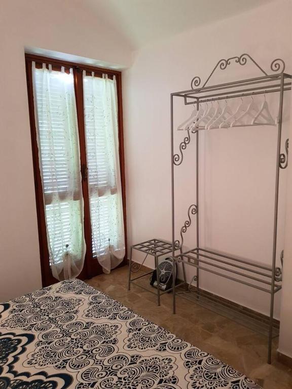 Posteľ alebo postele v izbe v ubytovaní Bed & Breakfast La Tana dei Sognatori