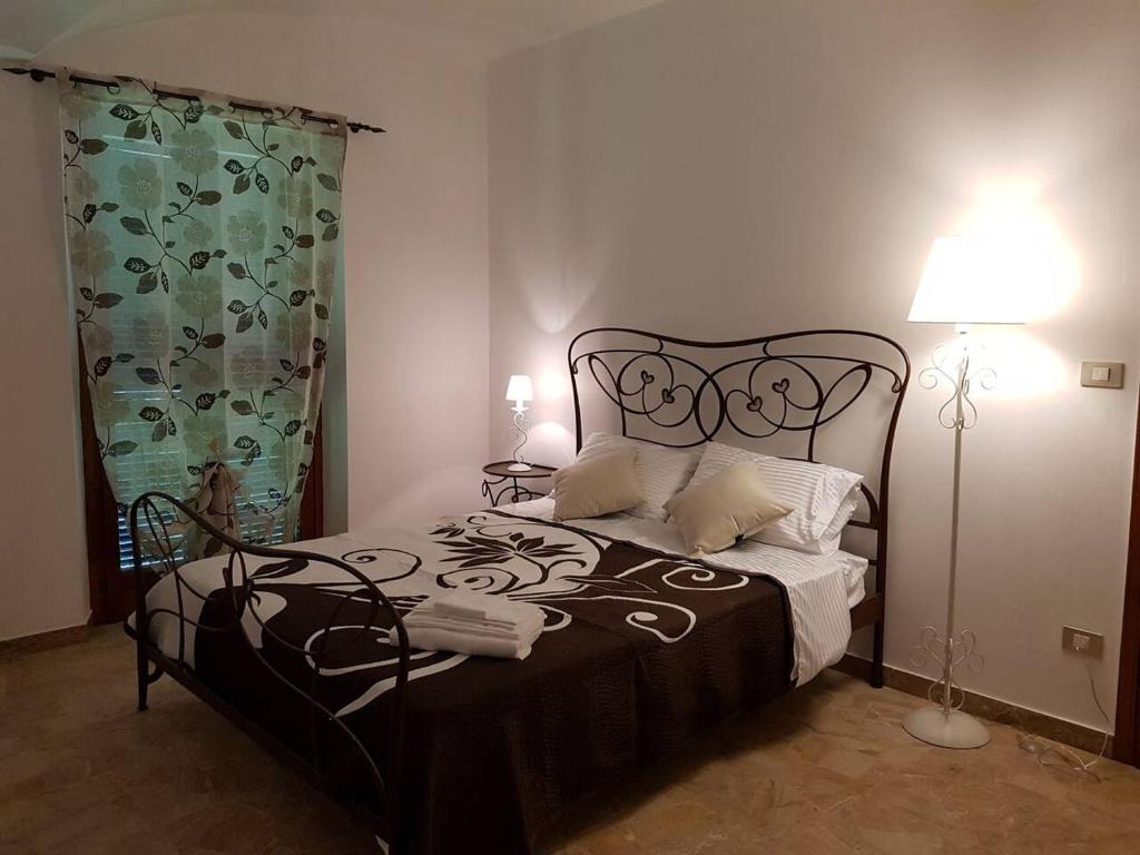 Posteľ alebo postele v izbe v ubytovaní Bed & Breakfast La Tana dei Sognatori