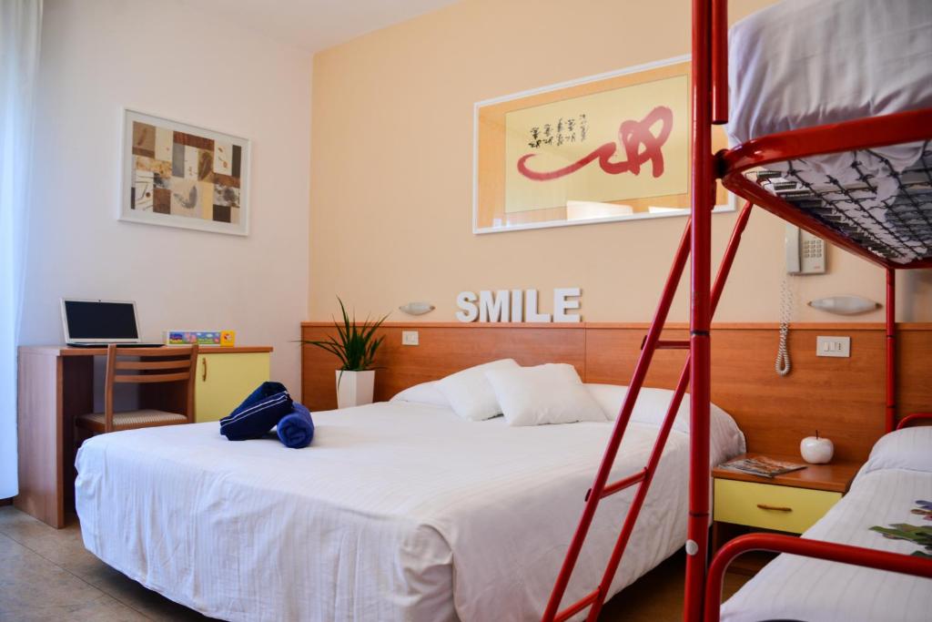 Postel nebo postele na pokoji v ubytování Hotel Domingo