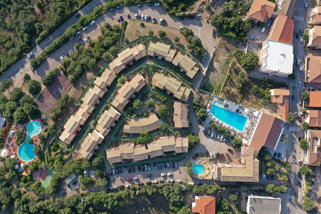 an aerial view of a resort with two pools at Residence Costa Del Turchese in Badesi