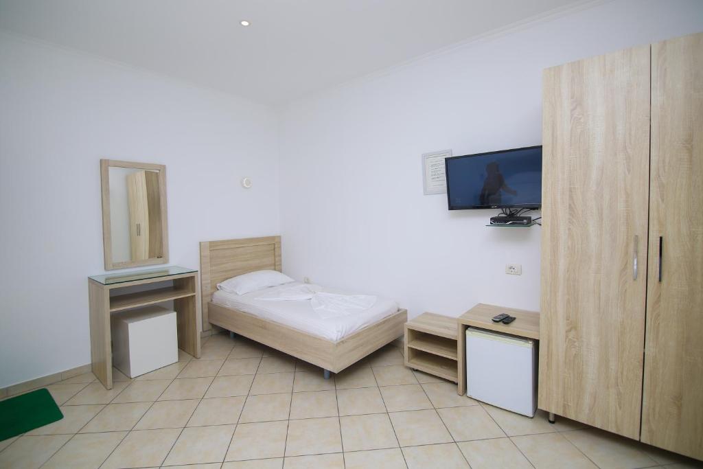 TV a/nebo společenská místnost v ubytování Hotel Jon