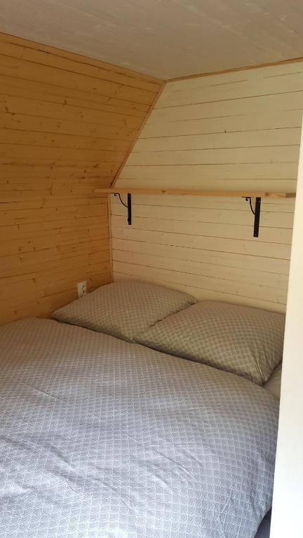 Postel nebo postele na pokoji v ubytování Chata Lužná