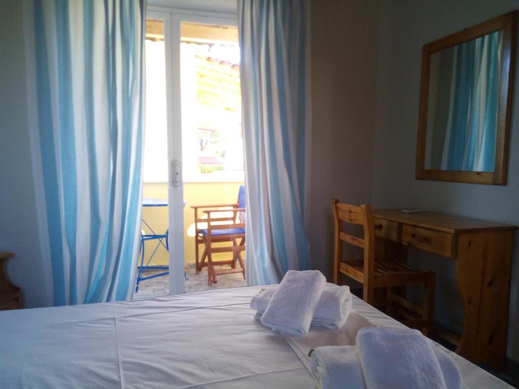 Postel nebo postele na pokoji v ubytování Summertime Apartments