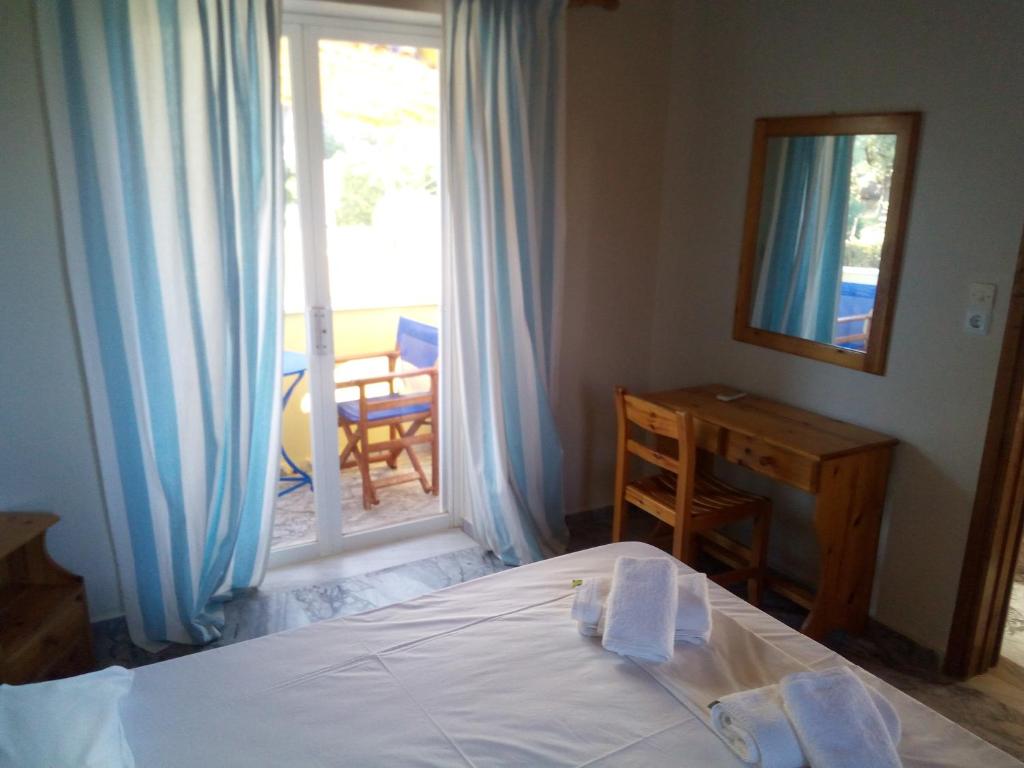 Postel nebo postele na pokoji v ubytování Summertime Apartments