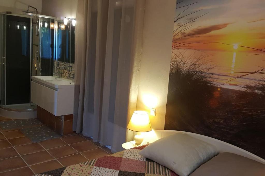 Koupelna v ubytování Logement avec piscine, classé 3 étoiles, de 42 m2 tout confort au calme pour un couple