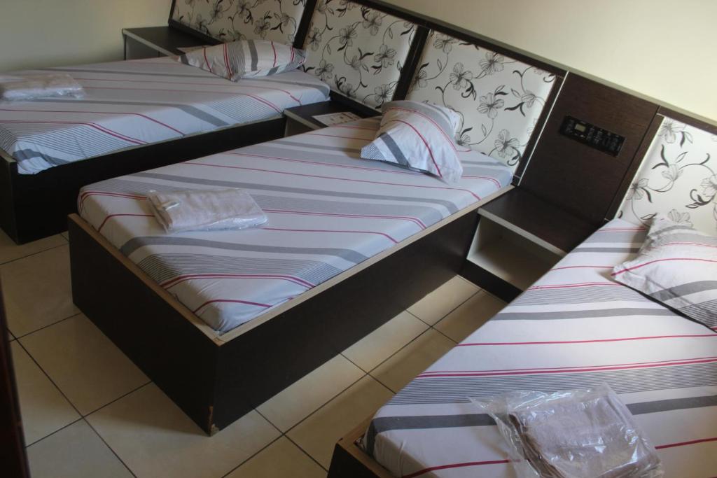 Postel nebo postele na pokoji v ubytování Hotel Cumbica Guarulhos